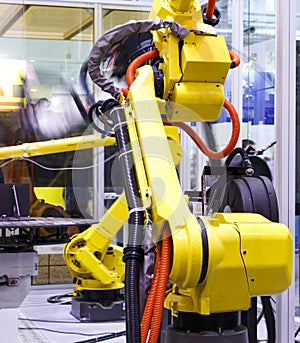 Moving part of robotic arm machine tool back view close up