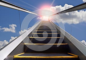 Moving staircase and blue sky