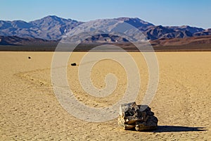 Moving Stones at the Racetrack Playa in Death Valley California with a depth of field