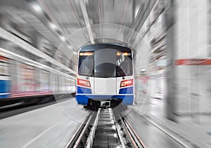 Moving train arrive station with motion blur