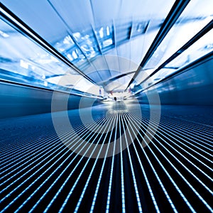 Moving travelator in office hall