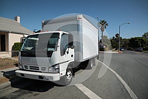 Moving truck on street