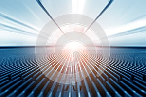 Moving walkway and light on background.