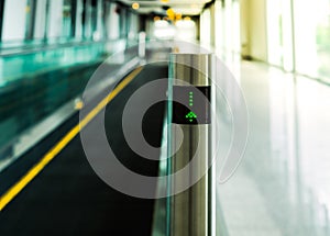 Moving walkway shown signage lighting screen, journey and traveler concept, selective focus.