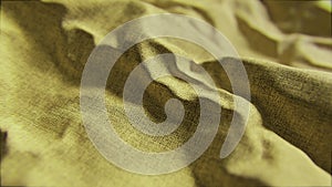 Moving yellow fabric material texture wave. Motion design of wavy canvas rough coarse linen cloth. Abstract 3d render