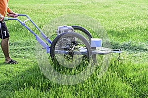 Mowers grass