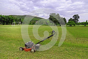 Mowing graass on the football field