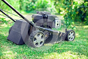 Mowing lawns, Lawn mower on green grass, mower grass equipment,