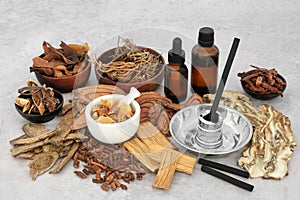 Moxibustion Treatment with Chinese Herbs and Spice photo