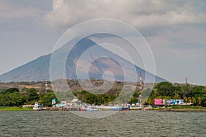 MOYOGALPA, NICARAGUA - MAY 1, 2016: View of Myogalpa village port at Ometepe island, Nicaragua. Volcano Concepcion in