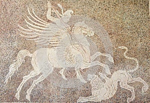 Mozaic of a horseman fighting a lion in Rhodes, Greece