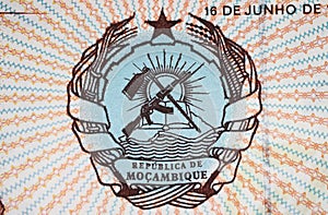 Mozambique Coat of arms national emblem on old Metical currency banknote