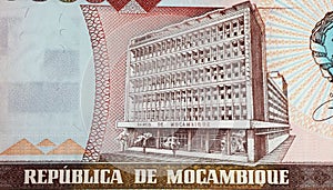 Mozambique national bank building on old Metical currency banknote from 1986