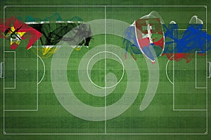 Mozambik vs slovensko futbalový zápas, národné farby, národné vlajky, futbalové ihrisko, futbalový zápas, kopírovať priestor