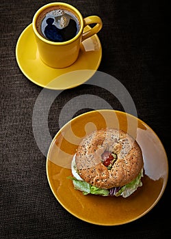 Mozarella sandwich and cup of coffee