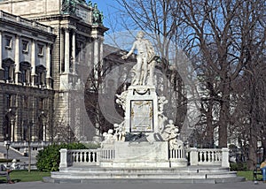 Mozart Statue in front of the Museum of Ethnology in park Burggarten. Vienna, Austria.