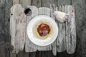 Mozzarella bocconcini balls in tomato and vegetable ragu sauce with spaghetti