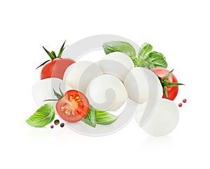 Mozzarella cheese balls, tomatoes, basil leaves and peppercorns for caprese salad isolated on white background. Mockup