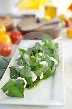 Mozzarella cheese with basil in skewers