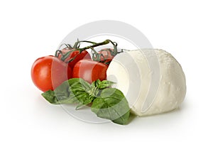 Mozzarella cheese, tomato and basil isolated on white background