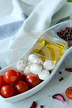 Mozzarella tomatoes and olive oil