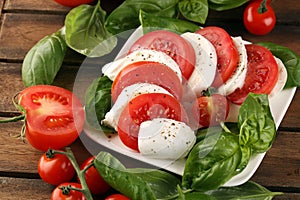 Mozzarella. Traditional italian food. White ball mozzarella buffalo Italian soft cheese with tomato and fresh basil