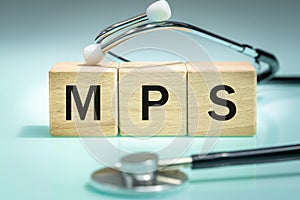 MPS, Written on wooden blocks, Mucopolysaccharidosis, a group of genetic diseases characterized by the excretion of sugar in the