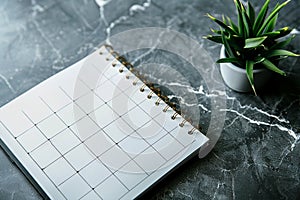 mpty calendar and note book on modern work table