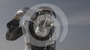 Mr disco man wearing gas mask and headphones