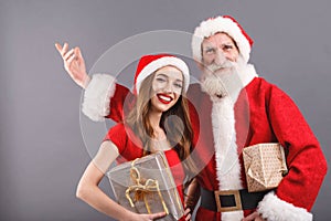 Mr. and Mrs. Claus Congratulates With Merry Christmass and Happy New Year