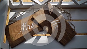 Mr and Mrs sign. Wooden plates decorated for wedding marriage.