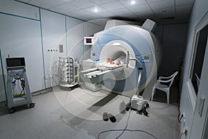 MR scanner in a hospital, with patient being scanned