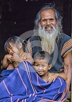 Mr. Taynguyen and his grandchildren happy