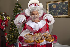 Mrs Claus bakes a treat for Santa photo