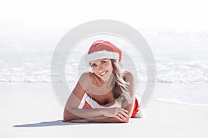 Mrs. Claus on tropical beach