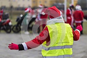 Mrs. Santa Claus directs traffic