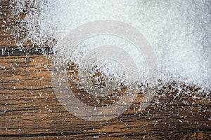 MSG / Heap of white monosodium glutamate on wooden background