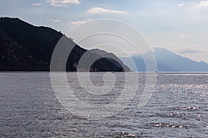 Mt Athos - Boat tour with panoramic view over the Mediterranean Aegean Sea. Looking the coastline of peninsula Athos, Chalkidiki