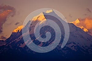 Mt. Cook closeup in orange sunrise time, New Zealand