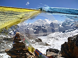 Mt. Everest and blurred prayer flags in Himalayas