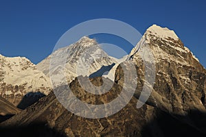 Mt Everest lit by golden evening light