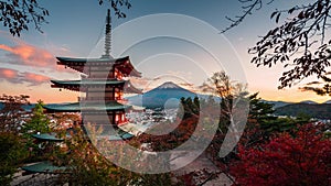 Mt. Fuji and Chureito Pagoda and red leaf in the autumn on sunset at Fujiyosh