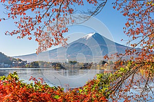 Mt. Fuji, Japan on Lake Kawaguchi with autumn foliage