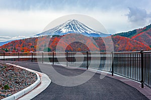 Mt. Fuji and lake in japan with red maple tree