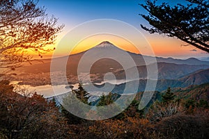 Mt. Fuji over Lake Kawaguchiko with autumn foliage at sunrise in Fujikawaguchiko, Japan