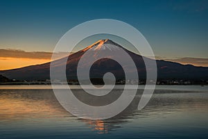 Mt. Fuji over Lake Kawaguchiko at sunrise in Fujikawaguchiko, Japan.