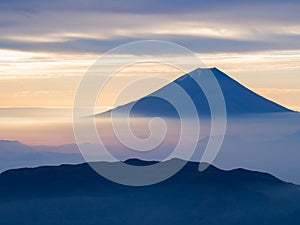 Mt. Fuji over the mist after sunrise