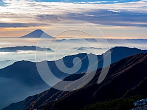 Mt. Fuji over the mist after sunrise