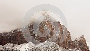 Mt. Kinesava in Zion Nat. park USA with clouds and snow