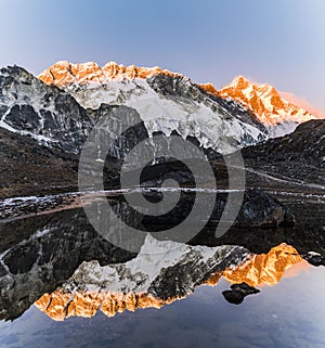 Mt Lothse and Nuptse sunset with lake mirror Himalaya